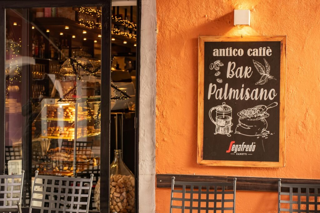 Venetian cafe scene with retro signage and warm inviting ambiance. Perfect for capturing Italian charm.