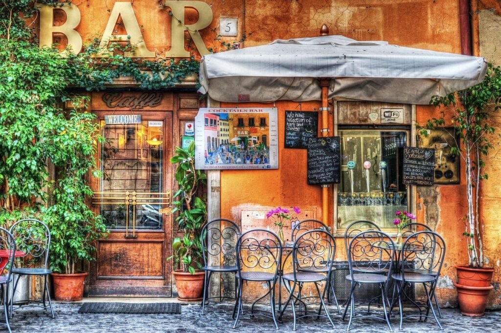 Vibrant outdoor café scene with colorful flowers and artistic details, perfect for urban exploration.
