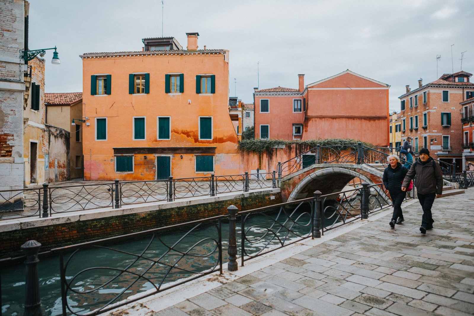 Northern Italy A picturesque scene of Venice with colorful buildings lining a serene canal, showcasing its unique architecture.